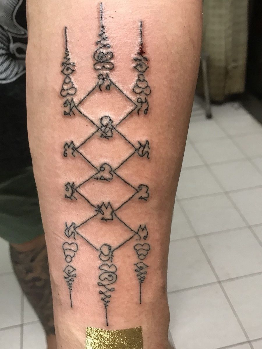 Diamond Net Yantra — traditional Thai Sak Yant tattoo in Thailand
