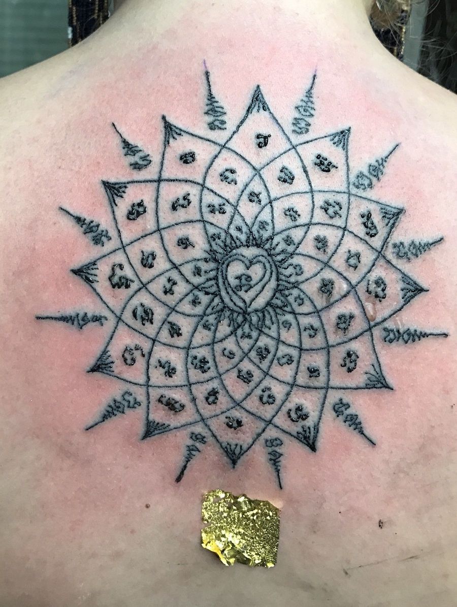 Lotus Yantra — traditional Thai yantra tattoo